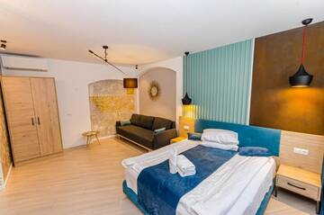 Фото номера Семейный полулюкс Отель Lumiere House Sibiu г. Сибиу 15