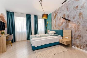Фото номера Улучшенный номер с кроватью размера «king-size» Отель Lumiere House Sibiu г. Сибиу 7