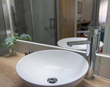 Фото номера Улучшенный двухместный номер с 1 кроватью Гостевой дом Brekner Rooms г. Сибиу 15
