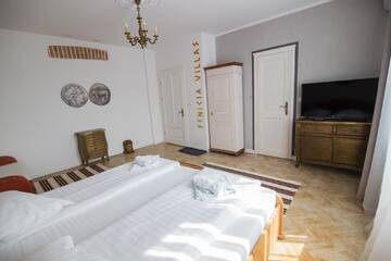 Фото номера Трехместный номер Гостевой дом Vila Antica г. Сибиу 6