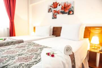 Фото номера Двухместный номер с 2 отдельными кроватями Отель Hotel Parc Sibiu г. Сибиу 6