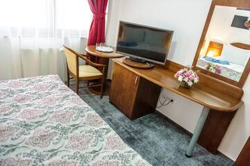 Фото номера Двухместный номер с 2 отдельными кроватями Отель Hotel Parc Sibiu г. Сибиу 11