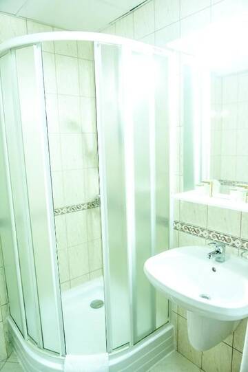 Фото номера Двухместный номер с 2 отдельными кроватями Отель Hotel Parc Sibiu г. Сибиу 13