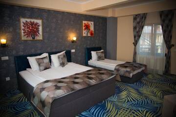 Фото номера Трехместный номер Отель Hotel Stefani г. Сибиу 4