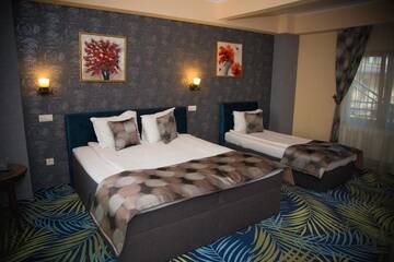 Фото номера Трехместный номер Отель Hotel Stefani г. Сибиу 5