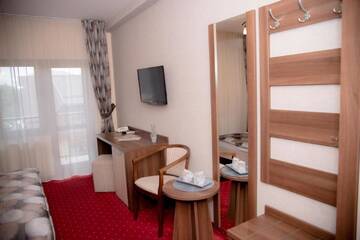 Фото номера Двухместный номер с 1 кроватью Отель Hotel Stefani г. Сибиу 4