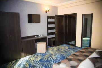 Фото номера Семейный люкс с 2 спальнями Отель Hotel Stefani г. Сибиу 21