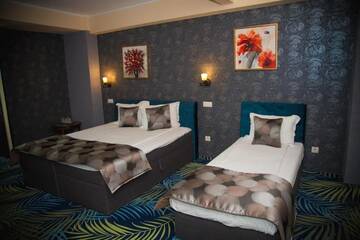 Фото номера Трехместный номер Отель Hotel Stefani г. Сибиу 7