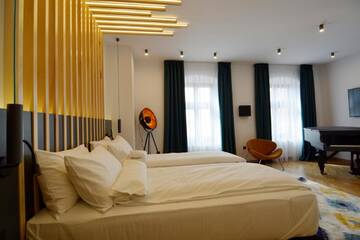 Фото номера Номер Делюкс Отели типа «постель и завтрак» Kleines Hotel г. Сибиу 14