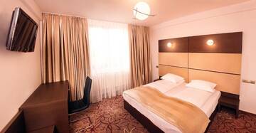 Фото номера Двухместный номер с 2 отдельными кроватями Отель Hotel Bliss г. Сибиу 8