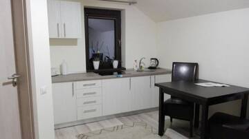 Фото номера Семейный люкс в мансарде Гостевой дом Amso Residence г. Сибиу 3
