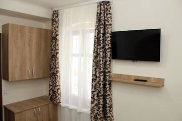Фото номера Двухместный номер с 1 кроватью Проживание в семье Apartament Lucretia - Centrul Sibiului г. Сибиу 10