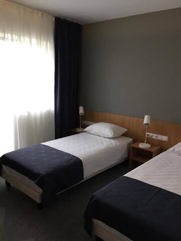 Фото номера Двухместный номер с 2 отдельными кроватями Отель Horeum Boutique Hotel г. Сибиу 2