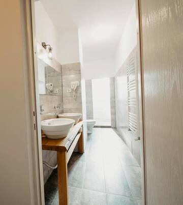 Фото номера Роскошный четырехместный номер Гостевой дом RIVIERA RESIDENCE г. Сибиу 4