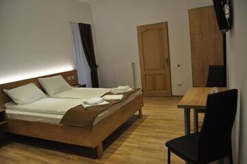 Фото номера Номер с кроватью размера «king-size» Гостевой дом 4Rooms Central Sibiu г. Сибиу 31