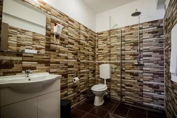 Фото номера Номер Делюкс Гостевой дом Gasthof Sara г. Сибиу 4