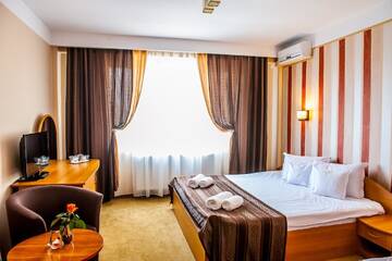 Фото номера Двухместный номер с 1 кроватью Отель Hotel Class Hermannstadt г. Сибиу 5