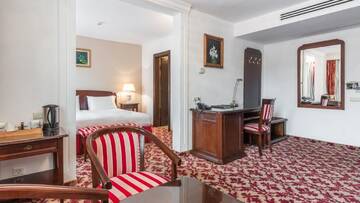 Фото номера Полулюкс с кроватью размера &quot;king-size&quot; Курортные отели Hilton Sibiu г. Сибиу 6