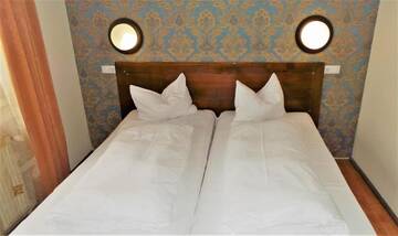Фото номера Двухместный номер с 2 отдельными кроватями Отель Hotel Sonne г. Сибиу 52