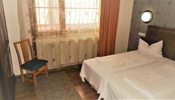 Фото номера Двухместный номер с 2 отдельными кроватями Отель Hotel Sonne г. Сибиу 15