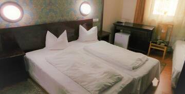 Фото номера Трехместный номер Отель Hotel Sonne г. Сибиу 12
