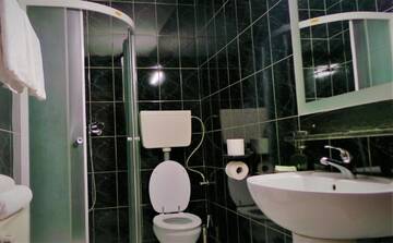 Фото номера Трехместный номер Отель Hotel Sonne г. Сибиу 7